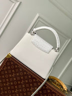 capucines mm 31.5 white taurillon leather silver hardware