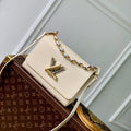 TWIST MM 23CM CREAM EPI GRAINED LEATH