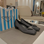 TRIANGLE LOGO PUMPS IN BLACK SATIN