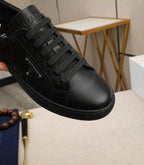 PRA RE-NYLON SNEAKERS IN BLACK LEATHER AND FABRIC