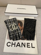 FINGERLESS GLOVES IN BLACK MIX WHITE WOOL TWEED 463847