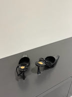 AIMÉE SLINGBACK PUMPS IN BLACK GLOSSY LAMBSKIN