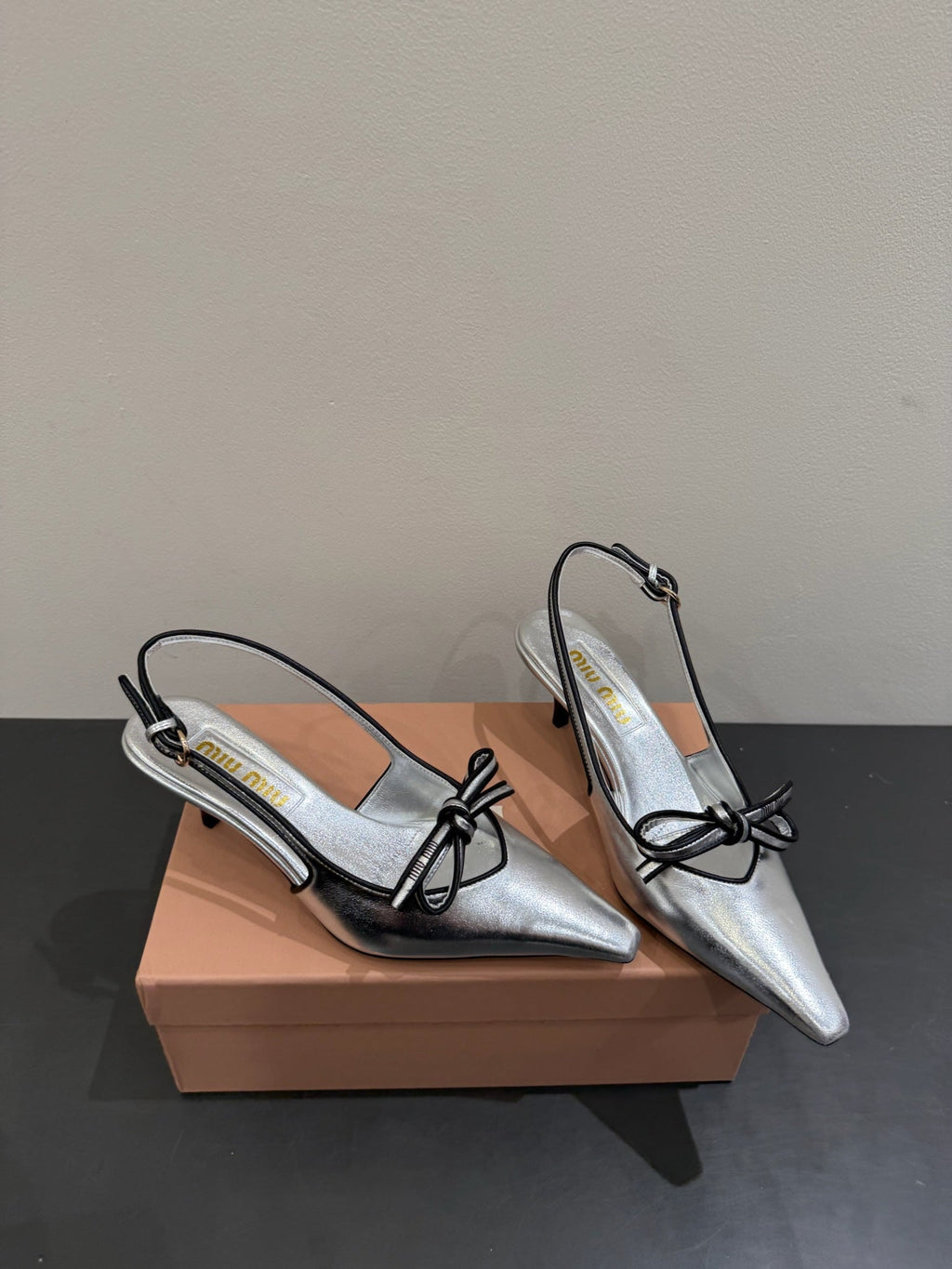 Miu slingback pump metallic sliver leather