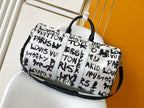 LVx N&PW Keepall Bandoulière 50 Black White Cowhide