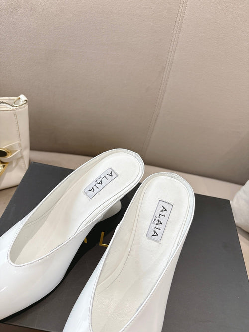 Alaia 25 Curve Wedge Mules White Lambskin 293554