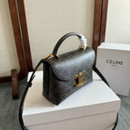 TEEN NINO BAG 20 IN BLACK TRIOMPHE CANVAS GOLD HARDWARE