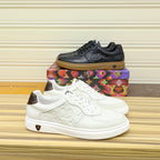 LV TRAINERS IN BLACK CALFSKIN AND BROWN RUBBER