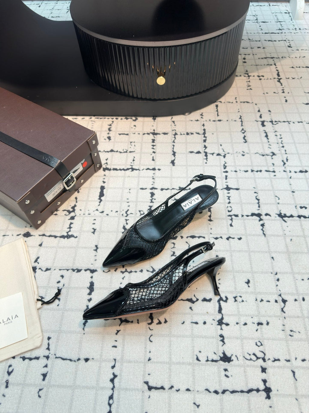ALAIA SLINGBACKS 5 CM IN BLACK CALFSKIN WITH MESH