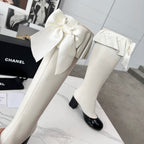 CC 25 high boots white black sheepskin 459457