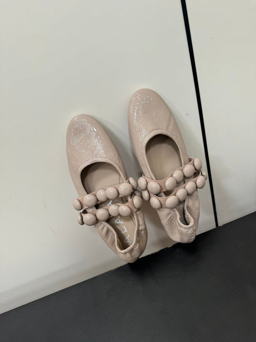 ALAIA SPHERE BALLET FLATS IN ALMOND BEIGE LAMBSKIN