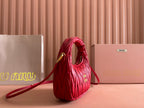 WANDER MATELASSÉ HANDBAG 23 IN CERISE RED LAMBSKIN