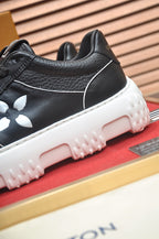 LV TRAINER BLACK MONOGRAM CALFSKIN