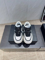 Chanel 25 Sneaker Black White Suede 540329