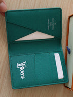 LV Pocket Organizer Monogram Heritage Canvas