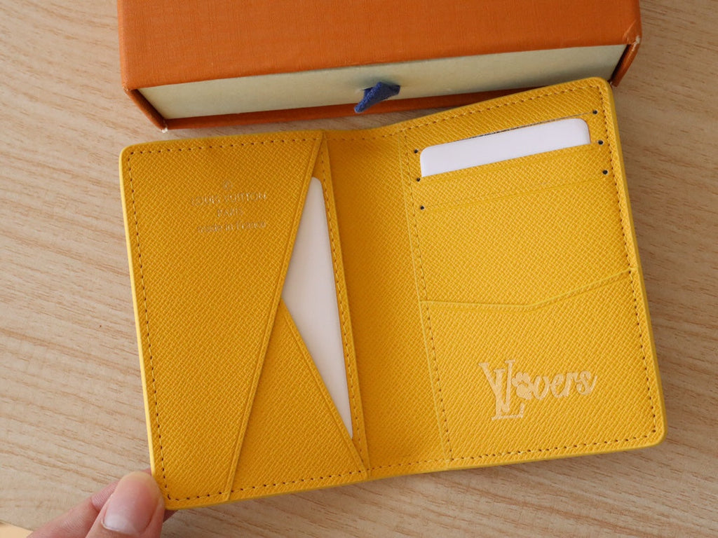 LV Pocket Organizer Monogram Heritage Canvas