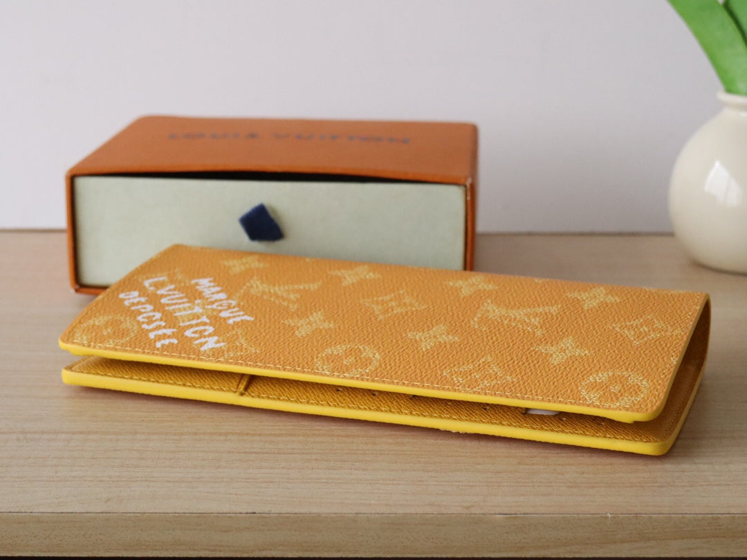 LV Brazza Wallet Yellow Monogram Heritage Canvas 224172