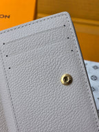 LV M25595 Cléa Wallet Dream Beige Embossed Grained Cowhide - Light GHW