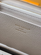 LV M25594 Zippy Wallet Dream Beige Embossed Grained Cowhide - Light GHW