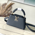 CAPUCINES EAST-WEST MINI 22 IN BLACK CALFSKIN GOLD HARDWARE