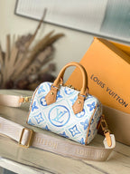 SPEEDY BANDOULIÈRE 20 IN LAGOON BLUE MONOGRAM TILES CANVAS GOLD BUCKLE