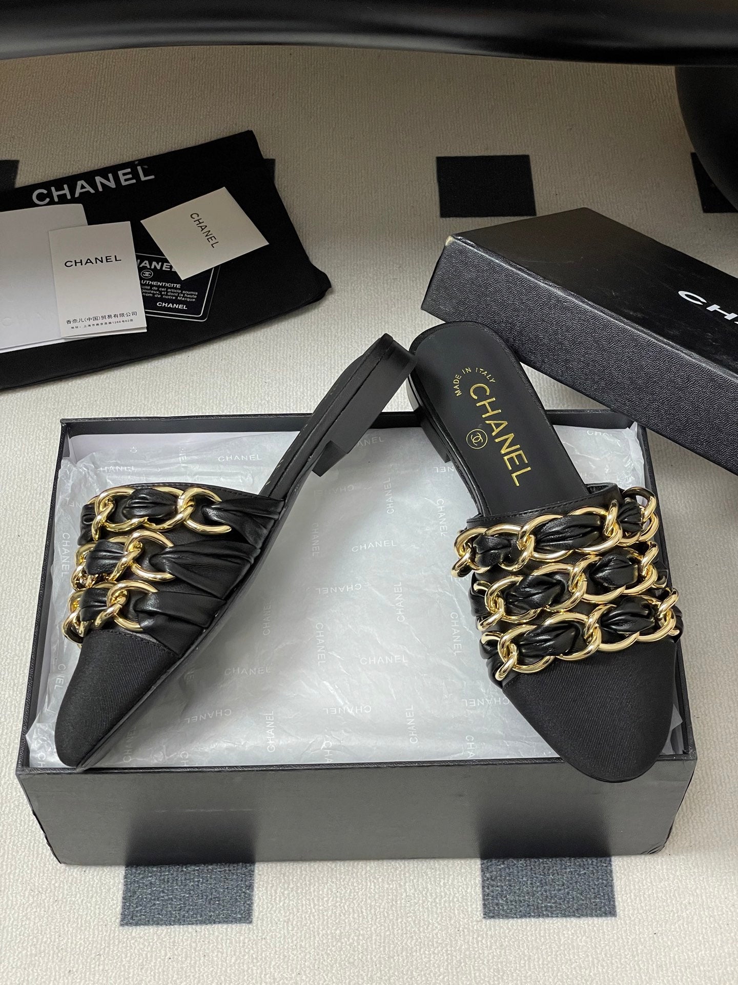 CC 25B Chain Closed Toe Flat Mule Black Sheepskin 393890