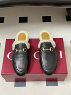 GG horsebit flat mules black cowhide 534713