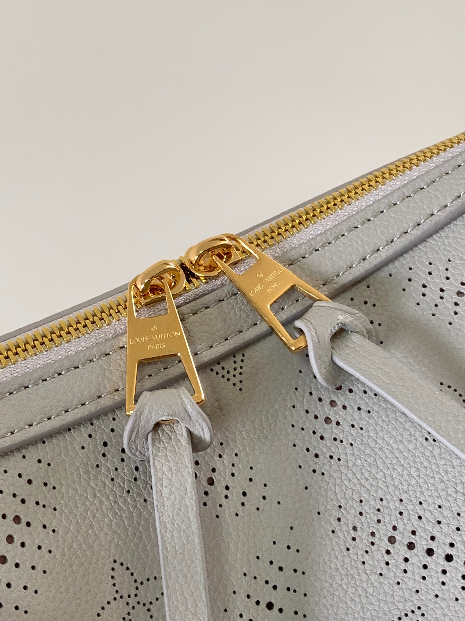 LV M13157 Hand It All PM Light Grey Perforated Mahina Calfskin