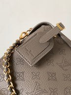 LV M25904 Hand It All PM Taupe Perforated Mahina Calfskin
