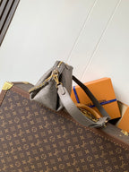 LV M25904 Hand It All PM Taupe Perforated Mahina Calfskin