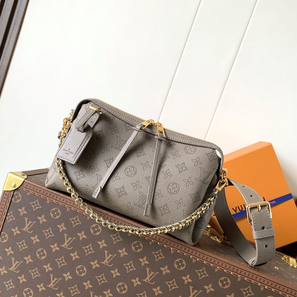 LV M25904 Hand It All PM Taupe Perforated Mahina Calfskin