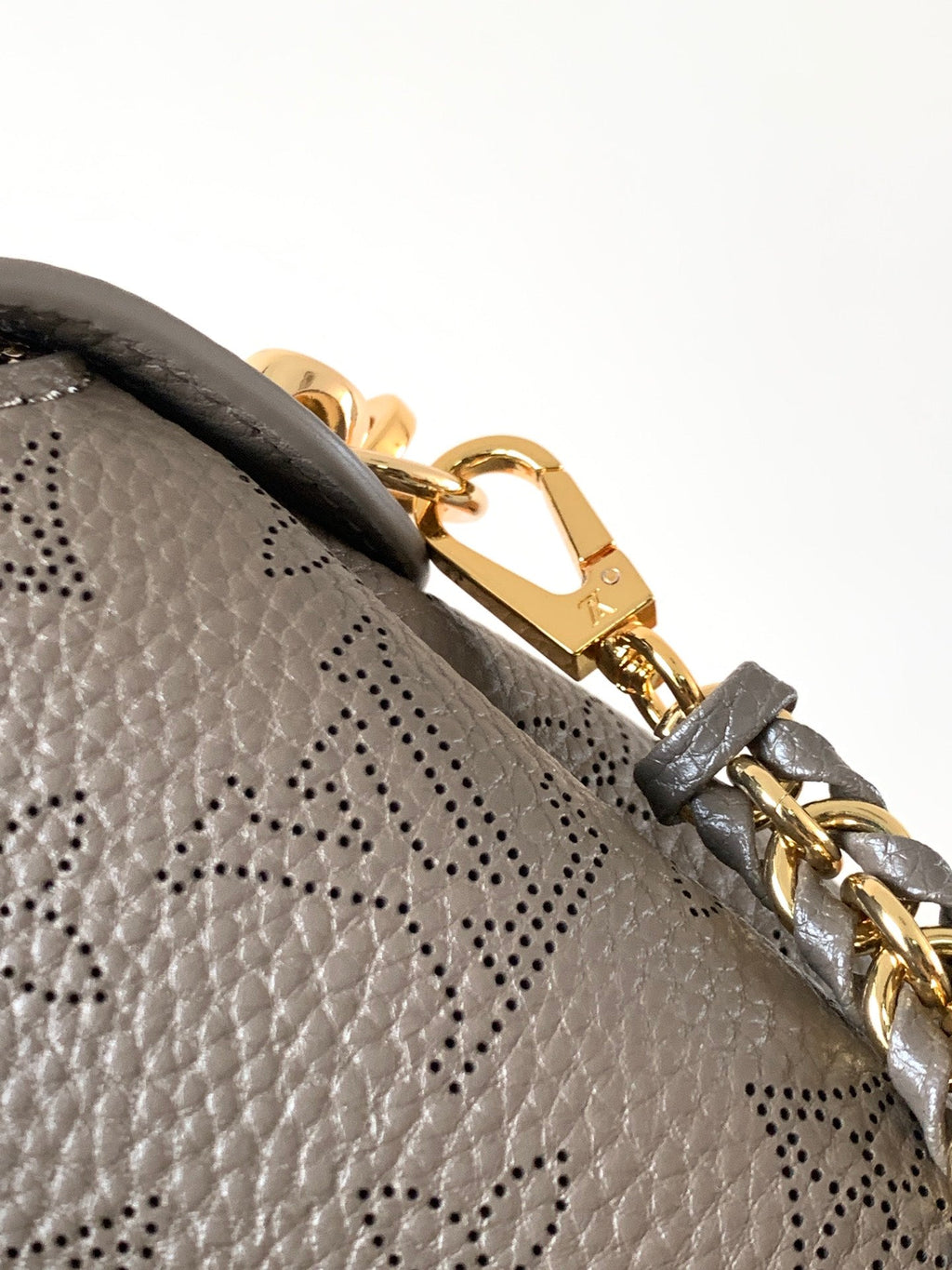 LV M25904 Hand It All PM Taupe Perforated Mahina Calfskin