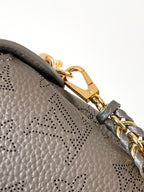 LV M25904 Hand It All PM Taupe Perforated Mahina Calfskin