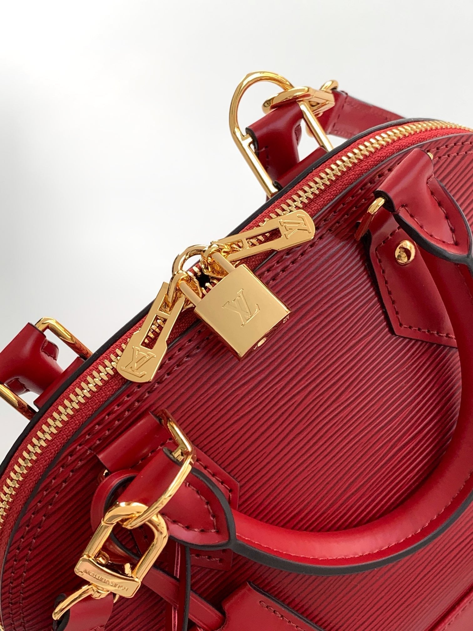 LV M25562 Alma BB Burgundy Epi Leather