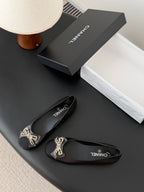 CC 26K Bow Ballet Flat Black Lambskin Canvas 670830