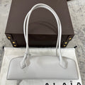 LE TECKEL MEDIUM BAG 32 IN PLATINUM GOATSKIN