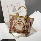 STEEPLE 28 BAG IN OFF-WHITE MIX BROWN CANVAS AND CALFSKIN