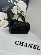24c mini flap bag 20cm with top handle all black calfskin