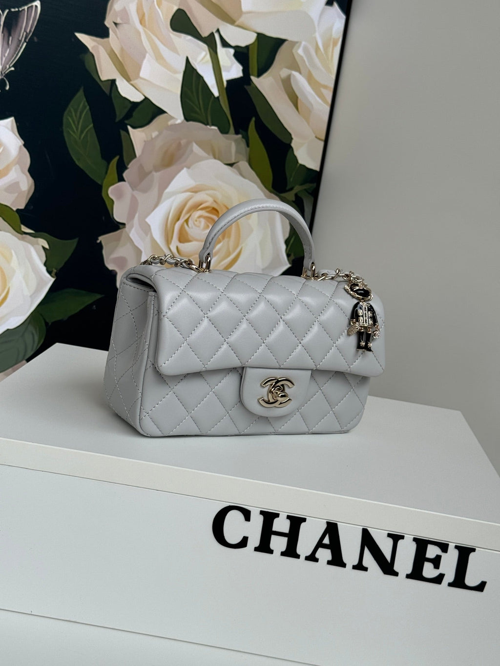 24c mini flap bag 20cm with top handle grey calfskin