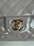 MINI FLAP BAG 20 IN LIGHT GRAY GLOSSY CALFSKIN GOLD HARDWARE