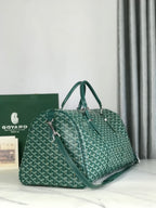 BOSTON 50 BAG IN GREEN GOYARDINE CANVAS AND CALFSKIN TRIM