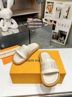 lv bliss flat mule cream canvas calfskin