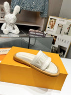 lv bliss flat mule cream canvas calfskin