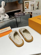lv bliss corss sandal mule cream textile calfskin