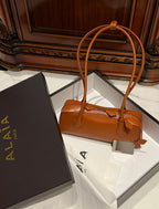LE TECKEL MEDIUM BAG 33 IN BRONZE ORANGE GOATSKIN