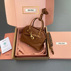 AVENTURE BAG 13 IN SANTA FE BROWN SHINY CALFSKIN