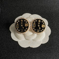 CC    Double C Clock Black Gold Earrings