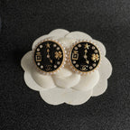 CC    Double C Clock Black Gold Earrings