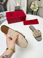 Vlogo embellished leather-trimmed raffia slides grey