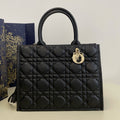 medium book tote 36 black lambskin gold hardware