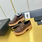 LOAFER WITH TRIANGLE LOGO IN CHOCOLATE BROWN CALFSKIN